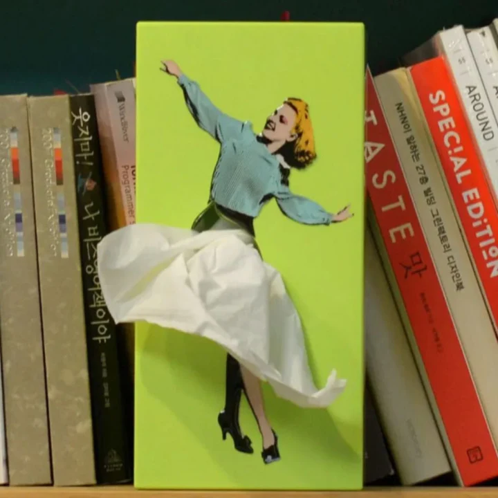 Ballerina Tissue Dispenser with Flowing Skirt Design and Easy Refill